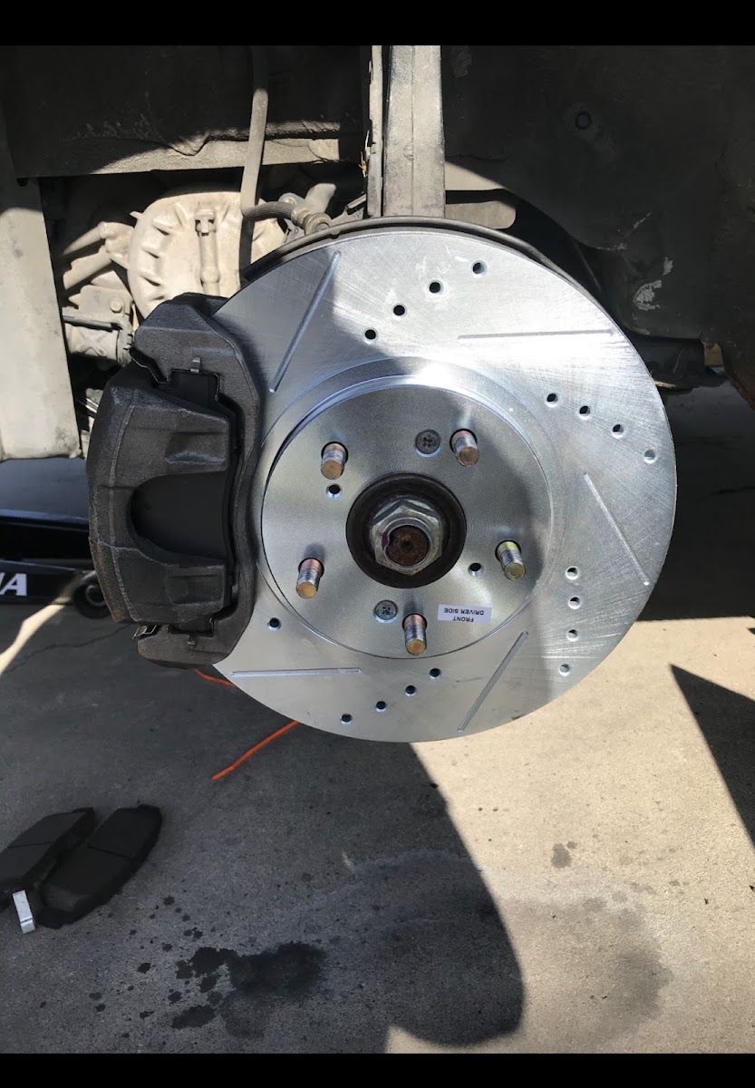 New drilled and slotted brake rotor fitted